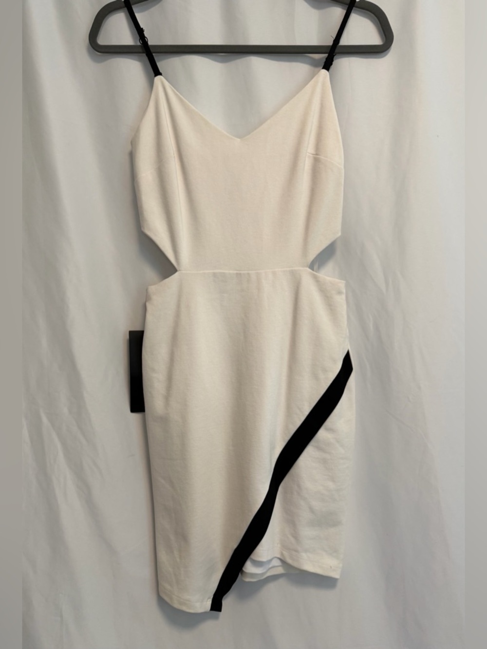 bebe NWT White Mini Bidycon Dress with Black Strap and AsymetricalTrim Small